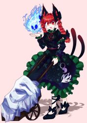 1girl animal_ears black_bow black_dress bow braid cat_ears cat_girl cat_tail commentary dress extra_ears full_body hair_bow highres hitodama kaenbyou_rin long_sleeves looking_at_viewer multiple_tails open_mouth patterned_background pink_background pointy_ears red_eyes side_braids signature simple_background skull standing tail touhou twin_braids two_tails wheelbarrow yoko_z