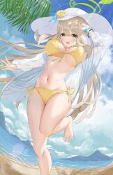 1girl absurdres arm_up barefoot beach bikini blue_archive breasts flower front-tie_bikini_top front-tie_top green_eyes green_halo halo hat hat_flower highres jacket large_breasts long_hair looking_at_viewer navel nonomi_(blue_archive) nonomi_(swimsuit)_(blue_archive) official_alternate_costume see-through_clothes see-through_jacket side-tie_bikini_bottom solo standing standing_on_one_leg string_bikini sun_hat swimsuit wet white_hat yellow_bikini yupita_da_vinci