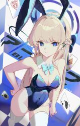 1girl absurdres ace_(playing_card) animal_ear_hairband animal_ears artist_name bare_shoulders blonde_hair blue_archive blue_bow blue_bowtie blue_eyes blue_hair blue_hairband blue_halo blue_leotard blue_streaks bow bowtie braid breasts card cleavage collar commentary covered_navel curled_fingers detached_collar dutch_angle ear_piercing english_commentary eyebrows_hidden_by_hair fake_animal_ears feet_out_of_frame from_above hair_bow hair_intakes hairband half-closed_eyes half_up_braid halo hand_on_own_hip headset highleg highleg_leotard highres large_bow leotard long_eyelashes long_hair looking_at_viewer medium_breasts multicolored_hair parted_hair parted_lips piercing playboy_bunny playing_card rabbit_ear_hairband rabbit_ears sideboob skindentation solo strapless strapless_leotard streaked_hair subu_art thick_eyelashes thighhighs thighs toki_(blue_archive) toki_(bunny)_(blue_archive) two-tone_hair very_long_hair walking white_collar white_thighhighs