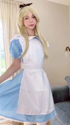 1girl alice_(alice_in_wonderland) alice_(alice_in_wonderland)_(cosplay) alice_in_wonderland animated apron arm_tattoo ass black_hairband black_panties blonde_hair blue_dress breasts cosplay curtains disney dress hairband highres huge_filesize indoors jewelry long_hair looking_at_viewer miamiaxof narrow_waist navel necklace nipples panties panty_pull petite photo_(medium) pussy pussy_peek real_life small_breasts standing tagme tattoo teasing thighhighs thong underwear video white_apron white_thighhighs wide_hips window