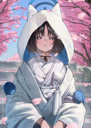 1girl betabeet black_hair black_ribbon blue_archive blue_sky blush bride cherry_blossoms commentary day ears_under_headwear falling_petals highres hood hood_up hooded_kimono japanese_clothes kikyou_(blue_archive) kimono light_smile looking_at_viewer neck_ribbon petals pink_petals ribbon short_hair sky solo uchikake wataboushi white_kimono wide_sleeves