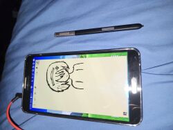 1girl 7-tan absurdres art_program_in_frame bed commentary english_commentary exif_rotation highres non-web_source pen phone photo_(medium) samsung samsung_galaxy_note_3 solo