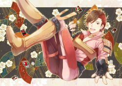 1boy :d black_gloves boots brown_boots brown_eyes brown_hair fingerless_gloves floating gloves hanafuda hand_fan jumpsuit letterboxed male_focus multicolored_hair one_eye_closed open_mouth outside_border outstretched_hand red_hair red_jumpsuit sengoku_basara shima_sakon_(sengoku_basara) short_hair smile solo teeth toruglose two-tone_hair upper_teeth_only