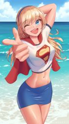1girl alien beach blonde_hair blue_eyes breasts cape dc_comics female_focus gloves grin hand_on_head happy headband kryptonian legs long_hair looking_at_viewer medium_breasts navel one_eye_closed open_mouth red_cape shiny_skin shirt skirt sky smile solo standing supergirl water white_shirt wink