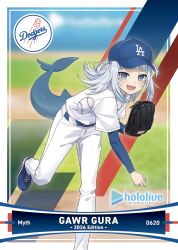 1girl :d amagai_tarou ball baseball baseball_(object) baseball_cap baseball_field baseball_glove baseball_stadium baseball_uniform belt blue_belt blue_eyes blue_hair blue_hat blue_shoes blue_undershirt blunt_bangs blurry blurry_background card_(medium) character_name commentary dated dated_commentary english_text floating_hair gawr_gura hat hololive hololive_english jersey layered_shirt leaning_forward long_hair long_sleeves looking_at_viewer los_angeles_dodgers multicolored_hair official_art open_mouth pants pitching pitching_mound promotional_art romaji_text sharp_teeth shirt shoes short_sleeves smile sneakers solo sportswear standing standing_on_one_leg streaked_hair teeth throwing two-tone_hair two_side_up v-shaped_eyebrows virtual_youtuber white_hair white_pants white_shirt