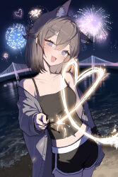 1girl :d absurdres animal_ears bare_shoulders beach black_hair black_tank_top blue_eyes blush breasts bridge cat_ears commentary facial_mark fang fireworks hair_ornament hairclip highres holding holding_fireworks indie_virtual_youtuber looking_at_viewer medium_breasts medium_hair midriff navel night night_sky ocean off_shoulder open_mouth outdoors seorang seorang_(vtuber) shorts sky smile solo sparkler tank_top