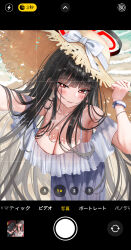 1girl absurdres armpits bare_shoulders black_hair black_halo blue_archive blue_dress blush bracelet breasts cleavage collarbone day dress earrings fake_phone_screenshot fake_screenshot halo hand_up hat highres hsxxx jewelry large_breasts long_hair looking_at_viewer necklace outstretched_arm parted_lips red_eyes rio_(blue_archive) shadow solo straw_hat very_long_hair wide_brim
