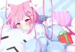 1girl alternate_costume animal_ear_fluff animal_ears blue_shirt blunt_bangs blush buruii_tte cat-shaped_pillow cat_ears cat_girl closed_mouth feet_out_of_frame gift hair_ornament hair_ribbon heart heart_hair_ornament indie_virtual_youtuber indoors long_hair long_sleeves looking_at_viewer lying on_bed on_stomach pajamas paw_print pillow pink_eyes pink_hair pink_nails pink_ribbon red_ribbon ribbon shirt sleeves_past_wrists smile solo split_mouth striped_pillow twitter_username virtual_youtuber yuuki_sakuna