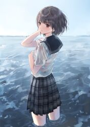 1girl absurdres black_hair blue_reflection_(series) blue_reflection_maboroshi_ni_mau_shoujo_no_ken brown_eyes from_behind hand_in_own_hair hand_on_own_chest highres hoshinomiya_girls&#039;_high_school_uniform kishida_mel looking_at_viewer looking_back ocean pleated_skirt school_uniform serafuku shirai_hinako shirt short_hair skirt solo standing wading wet wet_clothes wet_shirt