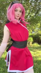 1girl ahegao animated arm_tattoo ass black_headband black_shorts blush breasts butt_crack clothes_lift clothes_pull cosplay day female_focus flashing grabbing_own_ass grass haruno_sakura haruno_sakura_(cosplay) headband highres huge_filesize jiggle looking_at_viewer medium_hair miamiaxof naruto_(series) navel nipples outdoors petite photo_(medium) pink_hair real_life red_shirt shirt shirt_lift short_shorts shorts shorts_pull sleeveless sleeveless_shirt small_breasts smile solo sound spanked spanking spanking_self tagme tattoo tree video