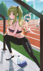 3girls absurdres black_pants black_sports_bra blurry brown_hair closed_mouth commentary_request commission day fieryonion green_eyes highres inuyama_aoi multiple_girls navel outdoors pants railroad_tracks side_ponytail skindentation smile solo_focus sports_bra stomach stretching sweat wireless_earphones yurucamp