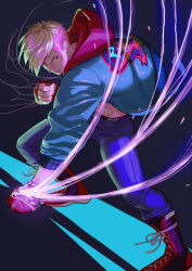 1boy absurdres asymmetrical_hair blonde_hair blue_pants boots clenched_hand clenched_teeth commentary denim dynamic_pose ed_(street_fighter) full_body hand_wraps highres hood hood_down hooded_jacket jacket jeans lace-up_boots looking_to_the_side male_focus male_underwear male_underwear_peek multicolored_jacket pants print_jacket red_hood scowl short_hair sideburns sideways_glance solo street_fighter street_fighter_6 symbol-only_commentary teeth tzchianh83105 undercut underwear unzipped zipper