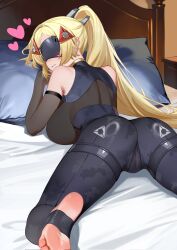 1girl ass black_pants blonde_hair breasts cameltoe crop_top eye_mask foot_out_of_frame from_behind heart highres indoors large_breasts long_hair lying on_bed on_stomach pants parted_lips pillow ponytail soles solo toes trigger_(zenless_zone_zero) yueyueyue_yao zenless_zone_zero