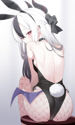 1girl alternate_costume animal_ear_hairband animal_ears ass back backboob bare_back black_bow black_choker black_hair black_horns black_leotard black_streaks blue_archive blush bow breasts choker demon_girl demon_horns demon_wings deyui ear_piercing fake_animal_ears fishnet_pantyhose fishnets from_behind gradient_background grey_background hair_bow hairband highres horns kayoko_(blue_archive) leotard long_hair looking_at_viewer looking_back multicolored_hair on_chair pantyhose piercing playboy_bunny rabbit_ear_hairband rabbit_ears rabbit_tail red_eyes single_wing sitting small_breasts solo strapless strapless_leotard streaked_hair tail two-tone_hair white_hair wings