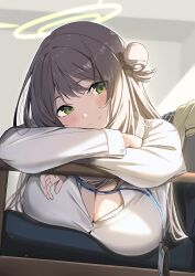 1girl absurdres blonde_hair blue_archive blush breasts cleavage green_eyes green_halo hair_bun halo head_on_arm highres id_card large_breasts looking_at_viewer mizumok1 nonomi_(blue_archive) resting single_side_bun smile solo