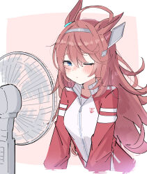 1girl absurdres ahoge animal_ears blue_eyes blush border brown_hair electric_fan grey_hairband hair_between_eyes hair_ornament hairband highres horse_ears horse_girl jacket long_hair mihono_bourbon_(umamusume) one_eye_closed pink_background ponzu_purin red_jacket simple_background solo tracen_training_uniform track_jacket umamusume white_border