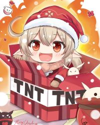 1girl ahoge blonde_hair blush box chibi christmas dress explosion explosive genshin_impact gloves hair_between_eyes hat highres in_box in_container klee_(genshin_impact) low_twintails open_mouth pointy_ears red_dress red_eyes santa_hat snow syyn_(syyndev) tnt tnt_block_(minecraft) twintails