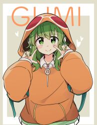 1girl absurdres character_name closed_mouth commentary_request cowboy_shot green_eyes green_hair green_nails gumi heart highres hood hoodie long_sleeves looking_at_viewer orange_hoodie pachio_(patioglass) puffy_long_sleeves puffy_sleeves shirt smile solo vocaloid white_shirt