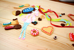 1girl aqua_hair beamed_eighth_notes blonde_hair blue_pantyhose closed_eyes closed_mouth commentary_request cookie diagonal-striped_legwear dress eighth_note floating_hair food fork from_side full_body green_hair hair_ribbon hatsune_miku heart holding holding_cookie holding_food knees_together_feet_apart long_hair long_sleeves masking_tape_(medium) mixed_media musical_note ojama_mushi_(vocaloid) original pantyhose parted_bangs photo_(medium) pink_dress profile red_ribbon ribbon ryono smile solo spoon traditional_media twintails unconventional_media very_long_hair vocaloid white_pantyhose