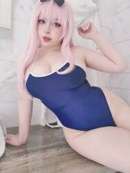 Rule 34 | 1girl, armpits, arms behind head, bathroom, blue eyes, breasts, cleavage, cosplay, cosplay photo, fujiwara chika, fujiwara chika (cosplay), highres, kaguya-sama wa kokurasetai ~tensai-tachi no renai zunousen~, large breasts, long hair, looking at viewer, one-piece swimsuit, photo (medium), pink hair, real life, sleeveless, smile, swimsuit, yoshinobi cos