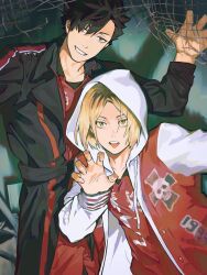 2boys arm_up black_coat black_hair blonde_hair brown_eyes brown_hair claw_pose coat collarbone commentary drawstring grin haikyuu!! hebi86070749 highres hood hood_up hoodie kozume_kenma kuroo_tetsurou lapels long_sleeves looking_at_viewer male_focus multicolored_clothes multicolored_hair multiple_boys net slit_pupils smile standing striped_clothes teeth tongue tongue_out vertical-striped_clothes yellow_eyes