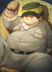 1boy arm_behind_back bara belt biscuit_griffon black_belt blush brown_hair chained_wrists fat fat_man gagged green_hat grey_jacket grey_pants gundam gundam_tekketsu_no_orphans hat highres jacket male_focus mandu_kuma pants pill short_hair sitting solo syringe tile_wall tiles