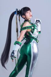 Rule 34 | 1girl, 2024, ass, bare shoulders, black hair, black trim, bodysuit, breasts, brown eyes, collarbone, commentary, cosplay, cosplay photo, english commentary, eve (stellar blade), eve (stellar blade) (cosplay), female focus, fingerless gloves, game console, gloves, green bodysuit, grey background, grey trim, hair ornament, head tilt, highres, hime cut, indoors, large breasts, larissa rochefort, lips, long hair, parted lips, photo (medium), planet diving suit (7th) (stellar blade), playstation 5, playstation controller, ponytail, real life, red lips, sideboob, simple background, solo, standing, stellar blade, thick thighs, thighs, very long hair, white gloves