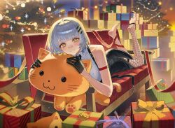 1girl arm_strap bandaid bandaid_on_face bandaid_on_nose bare_shoulders barefoot black_gloves black_necktie blonde_hair blunt_bangs box breasts chest_harness christmas_lights christmas_ornaments christmas_present christmas_tree colored_inner_hair commentary commission couch cushion eyelashes fishnet_thighhighs fishnets formal_clothes gift gift_box gloves grey_hair hachi_(live_union) hair_intakes half_gloves harness highres hugging_object light_blush live_union looking_at_viewer lying mole mole_under_eye multicolored_hair necktie number_hair_ornament on_couch on_stomach rhine_(overtonerhine) ribbon shirt shirt_tucked_in short_hair side_slit single_thighhigh skirt skirt_suit sleeveless sleeveless_shirt smile soles solo stuffed_animal stuffed_toy suit the_pose thigh_strap thighhighs toeless_legwear two-tone_hair virtual_youtuber white_shirt wing_collar yellow_eyes