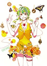 1girl absurdres ahoge asagi_kino bare_arms bare_shoulders belt_buckle blush brown_eyes buckle bug butterfly cable character_name christmas_ornaments collared_shirt commentary_request cowboy_shot food fruit gumi hands_up highres holding holding_microphone insect looking_at_viewer masking_tape_(medium) medium_hair microphone miniskirt mixed_media open_mouth orange_skirt orange_vest pleated_skirt shirt skirt smile solo straight-on swept_bangs thigh_strap thighs traditional_media two-tone_shirt unconventional_media vest vocaloid w white_background white_shirt yellow_shirt