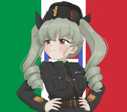 1girl anchovy_(girls_und_panzer) benito_mussolini benito_mussolini_(cosplay) black_cat03 black_jacket black_necktie black_ribbon closed_mouth commentary cosplay drill_hair english_commentary fascist flag_background frown girls_und_panzer green_hair green_jacket hair_ribbon hands_on_own_hips hat highres italian_flag italian_kingdom_flag jacket long_hair military_dress_uniform military_hat military_jacket military_uniform necktie purple_eyes ribbon solo twin_drills