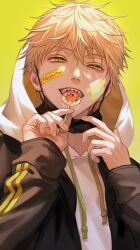 1boy alternate_costume am88121 bandaid bandaid_on_face black_mask blonde_hair candy chainsaw_man copyright_name denji_(chainsaw_man) food gauze gauze_on_face highres holding holding_candy holding_food holding_lollipop hood hoodie lollipop long_sleeves looking_at_viewer male_focus mask mouth_mask open_mouth pochita_(chainsaw_man) sharp_teeth short_hair simple_background solo tee teeth upper_body yellow_background yellow_eyes