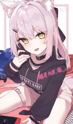 1girl ahoge animal_ear_fluff animal_ears ayayayaya63 belt between_legs black_choker black_hoodie bow bright_pupils choker commentary_request crop_top cropped_hoodie drawstring extra_ears fishnets hair_bow hair_ornament hairclip half_updo hand_between_legs hand_up highres hood hood_down hoodie indie_virtual_youtuber long_hair looking_at_viewer midriff_peek multicolored_nails nail_polish nintendo_switch open_mouth second-party_source shachikuzu_kareha short_shorts shorts sitting smile solo tail thigh_belt thigh_strap thighs virtual_youtuber wariza white_hair white_shorts wolf_ears wolf_tail yellow_eyes