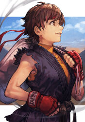 1girl bag belt black_belt brown_eyes brown_hair capcom dougi female_focus fingerless_gloves from_side gloves hand_up headband hungry_clicker karate_gi kasugano_sakura martial_arts_belt mma_gloves open_mouth outside_border padded_gloves red_gloves red_headband revision short_hair sky solo street_fighter undershirt upper_body