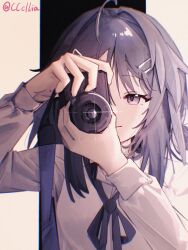 1girl absurdres ahoge arknights camera hair_ornament highres holding holding_camera la_pluma_(arknights) long_sleeves sakuratani_hane shirt solo white_shirt