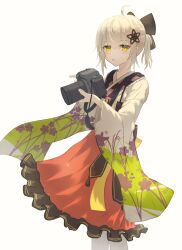 Rule 34 | 1girl, ahoge, arknights, blonde hair, blush, camera, closed mouth, commentary, cowboy shot, expressionless, floral print, floral print sleeves, frilled skirt, frills, grey background, hair between eyes, hair ornament, highres, holding, holding camera, japanese clothes, kimono, long sleeves, looking at viewer, official alternate costume, orange skirt, pantyhose, print sleeves, salt on dice, scene (arknights), scene (betsushi) (arknights), short hair, simple background, skirt, solo, standing, white pantyhose, wide sleeves, yellow eyes, yellow kimono