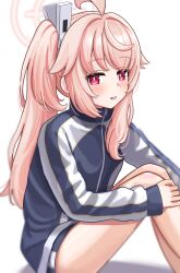 1girl absurdres ahoge alternate_costume bare_legs bilingual_commentary blue_archive blue_jacket blue_shorts bright_pupils commentary_request feet_out_of_frame grey_jacket gym_shorts hair_intakes halo hand_on_own_knee highres jacket knees_up light_blush long_hair looking_at_viewer mixed-language_commentary multicolored_jacket natsu_(blue_archive) onemune6 parted_lips pink_eyes pink_hair pink_halo shadow short_shorts shorts side_ponytail sidelocks sitting smile solo track_jacket two-tone_jacket white_background white_pupils