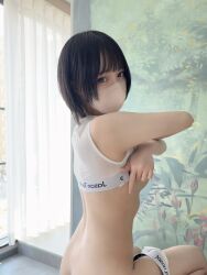 1girl black_hair bra breasts curtains face_mask highres indoors japanese_(nationality) katekyo_nene looking_at_viewer mask out-of-frame_censoring panties photo_(medium) real_life short_hair sideboob underboob underwear undressing white_bra white_panties