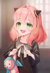 1girl ahoge anya_(spy_x_family) black_dress blurry blurry_background blush child collarbone commentary cone_hair_bun dress green_eyes grey_ribbon hair_bun highres holding holding_stuffed_toy horns long_hair long_sleeves neck_ribbon pink_hair prana_(prana12) ribbon smile solo spy_x_family stuffed_animal stuffed_toy teeth upper_teeth_only wide_sleeves