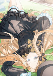 1girl abigail_williams_(fate) absurdres black_bow black_dress black_hat blonde_hair blue_eyes bow breasts dress fate/grand_order fate_(series) forehead hair_bow hat highres long_hair long_sleeves looking_at_viewer lying miyu10366 on_back orange_bow parted_bangs ribbed_dress sleeves_past_fingers sleeves_past_wrists small_breasts solo