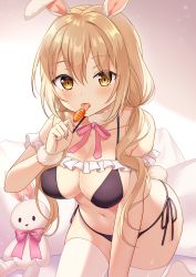 1girl animal_ears bare_shoulders bikini black_bikini blush breasts brown_eyes cleavage commentary_request hair_between_eyes halterneck hand_up highres holding large_breasts light_brown_hair long_hair looking_at_viewer low_twintails navel no_shoes original pillow rabbit_ears rabbit_girl rabbit_tail side-tie_bikini_bottom solo string_bikini stuffed_animal stuffed_rabbit stuffed_toy swimsuit tail thighhighs tongue tongue_out twintails very_long_hair white_thighhighs yuusa