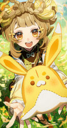 1girl bell braid braided_hair_rings brown_eyes brown_hair commentary_request day flower genshin_impact green_jacket hair_bell hair_flower hair_ornament hair_rings highres jacket jingle_bell long_sleeves looking_at_viewer medium_hair open_mouth outdoors puffy_lips shibuki_kamone solo teeth upper_teeth_only yaoyao_(genshin_impact) yellow_flower