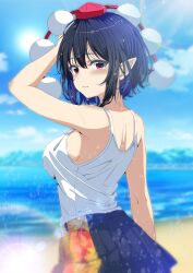 1girl alternate_costume back beach black_hair black_skirt blush breasts from_behind hat highres kitaura_kasumi leaf_print looking_at_viewer looking_back median_furrow outdoors pleated_skirt pointy_ears red_eyes red_hat shameimaru_aya short_hair sideboob sidelocks skirt smile solo sweat tank_top tokin_hat touhou white_tank_top