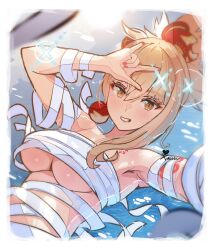 1girl \m/ artist_name bandages bare_shoulders blonde_hair border breasts commentary genshin_impact grin hair_ornament highres large_breasts looking_at_viewer naked_bandage orange_eyes orange_nails selfie smile solo underboob valenthania white_border yoimiya_(genshin_impact)