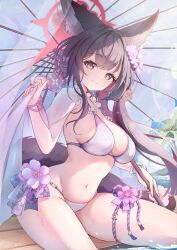 1girl animal_ear_fluff animal_ears bead_bracelet beads bikini blue_archive blush bracelet breasts brown_hair closed_mouth flower fox_ears fox_girl fox_tail hair_flower hair_ornament halo highres holding jewelry large_breasts long_hair looking_at_viewer navel ocean official_alternate_costume outdoors purple_flower red_halo sitting smile solo string_bikini swimsuit tail tomo_(tomosa011326) umbrella very_long_hair wakamo_(blue_archive) wakamo_(swimsuit)_(blue_archive) yellow_eyes