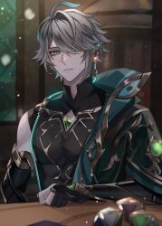 1boy ahoge alhaitham_(genshin_impact) bare_shoulders black_gloves black_shirt blurry blurry_background blurry_foreground cable cape card closed_mouth commentary_request depth_of_field dice elbow_gloves expressionless gem genius_invokation_tcg genshin_impact gloves gold_trim green_cape green_eyes green_gemstone green_hair greentea7954 grey_hair hair_over_one_eye highres indoors light_particles looking_at_viewer male_focus multicolored_hair parted_bangs partially_fingerless_gloves playing_card shirt short_hair sidelocks single_bare_shoulder sitting sleeveless sleeveless_shirt solo swept_bangs upper_body vision_(genshin_impact)