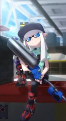 1girl baseball_cap black_hat black_pants blue_eyes blue_pupils boots collared_shirt commentary_request e-liter_4k_(splatoon) earrings gakusei_noa green_shirt gun hat highres holding holding_gun holding_weapon hoop_earrings in-universe_location inkling inkling_girl inkling_player_character jewelry long_hair nintendo pants pointy_ears shirt sitting solo splatoon_(series) splatoon_3 tentacle_hair weapon white_hair