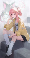 1girl black_shoes black_skirt blue_archive bright_pupils hair_bun highres jacket jianjia natsu_(band)_(blue_archive) natsu_(blue_archive) pink_eyes pink_hair shoes skirt socks solo white_pupils white_socks yellow_jacket