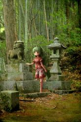 1girl arinu bamboo bamboo_forest commentary_request curly_hair female_focus forest green_eyes green_hair heart horns kariyushi_shirt komainu komano_aunn long_hair looking_at_viewer moss nature outdoors pedestal photo_background pointy_ears short_sleeves shorts single_horn smile solo stone_lantern tail touhou translation_request tree