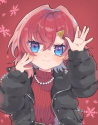 1girl alternate_costume ange_katrina black_jacket blue_eyes blush chu_mochi closed_mouth crossed_bangs hair_between_eyes hair_intakes hair_ornament hand_on_own_cheek hand_on_own_face hands_up hashtag-only_commentary highres jacket jewelry long_sleeves looking_at_viewer medium_hair multicolored_eyes necklace nijisanji padded_jacket pearl_necklace purple_eyes red_background red_hair red_sweater smile snow_on_clothes snow_on_head snowflakes solo split_mouth straight-on sweater triangle_hair_ornament two-tone_eyes upper_body virtual_youtuber waving