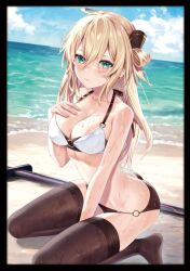 1girl alternate_costume beach between_legs bikini blonde_hair blush breasts cleavage closed_mouth collarbone duel_monster green_eyes hair_between_eyes hair_ornament hand_between_legs hand_on_own_chest highres long_hair looking_at_viewer o-ring o-ring_bikini ocean sand sky_striker_ace_-_raye swimsuit sword thighhighs weapon wet yu-gi-oh! yuya_(night_lily)